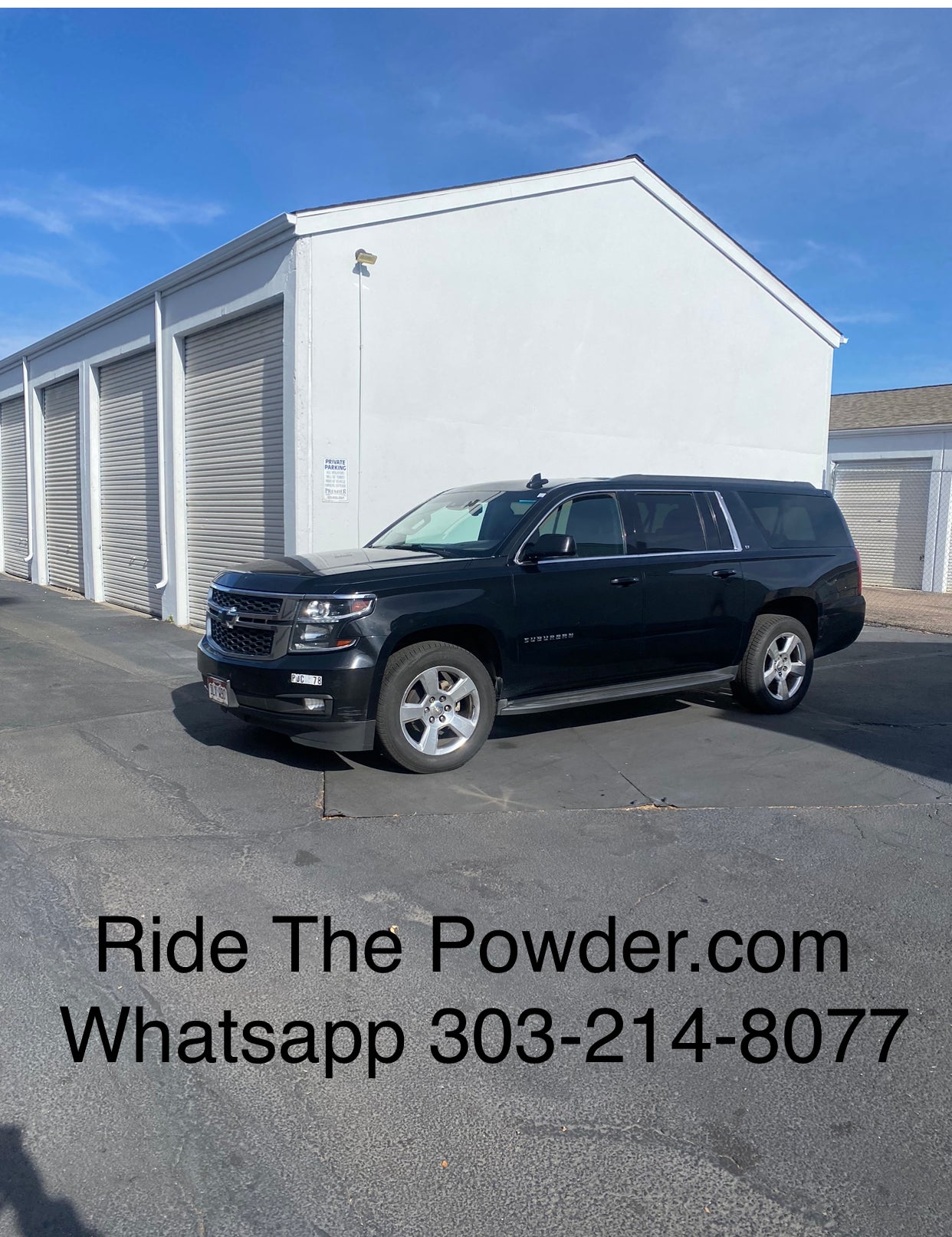 Black SUV parked at Powderhound Warehouse